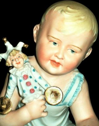Antique German Victorian Heubach Era Piano Baby Girl Doll Jester Bisque Figurine