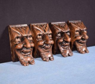 Set Of 4 French Antique Highly Carved Faces In Walnut Wood Trim