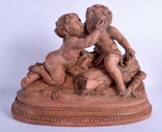 A Large 19th Century French Terracotta Figure Of A Boy And Girl