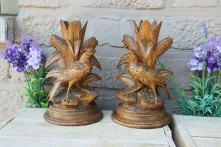 Pair Antique Swiss Black Forest Wood Carved Candle Holder Vases Bird