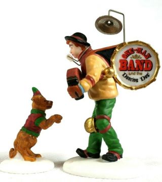 Dept 56 Christmas In The City One - Man Band And The Dancing Dog Set Of 2 58891