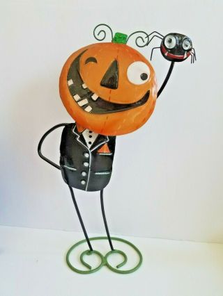 Halloween Pumpkin Wire Man Holding Up A Spider Figurine 11 Inches Tall