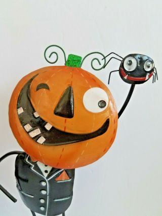 Halloween Pumpkin Wire Man Holding Up A Spider Figurine 11 Inches Tall 2