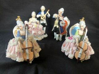 4 X Antique Dresden Lace Figurine.  Musicians.  Marked Bottom