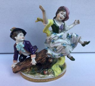Alteste Volkstedter Porcelain Figurine Of Boy And Girl On A See - Saw,  Mid 20th C