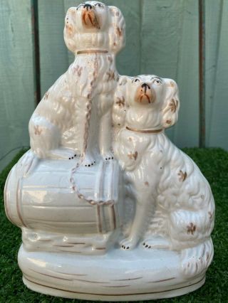 Mid 19thc Staffordshire Spaniel Dogs,  One Seated On A Barrel C1860s