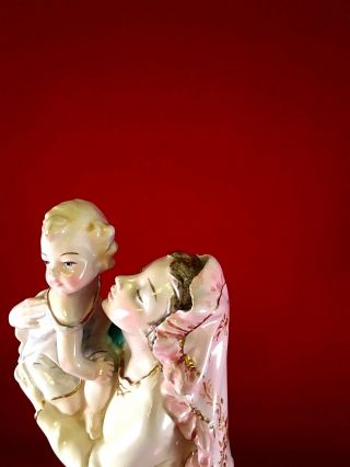 Vintage Italian Porcelain Ceramic Figurine Lady holding child 12.  75 