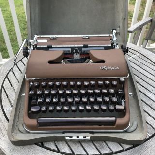 Vintage Olympia Deluxe Portable Typewriter Sm3 In Brown,  With Hard Shell Case
