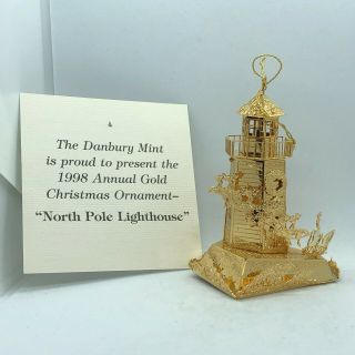 1998 Danbury Annual Gold Christmas Tree North Pole Lighthouse Ornament
