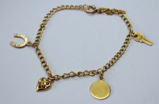 Vintage 9ct Yellow Gold 4 Charm Bracelet With A Bolt Ring Clasp