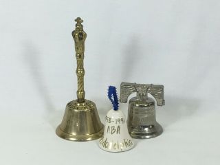 Two Convention Bells From The American Bell Association And A Table Favor