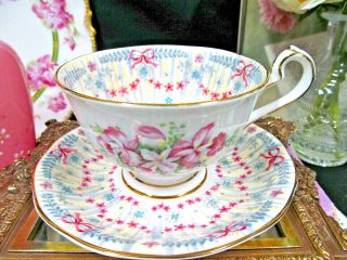 Queen Anne Tea Cup And Saucer Bridal Gown Pattern Pink Orchid & Ribbon Teacup