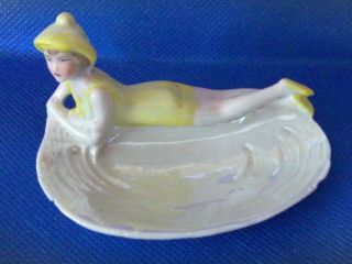 Antique German Porcelain Reclining Bathing Beauty In Yellow Coin Or Jewelry Hold
