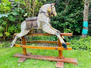 Classic,  Old Antique Wooden Rocking Horse On Wooden Stand With Horsehair Tail