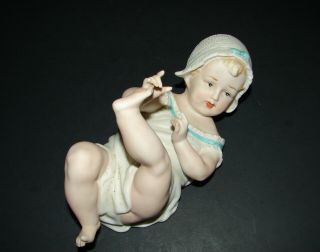 Antique Gebruder Heubach Bisque Porcelain Piano Baby Playing On Her Back 6127
