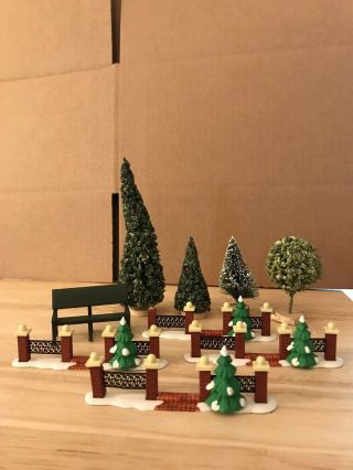 4 Trees,  1 Bench,  4 Fences With Gate Openings.  Department 56.  Snow Village.