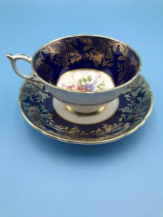 Rare Paragon Tea Cup & Saucer Set Floral Gold And Blue Design