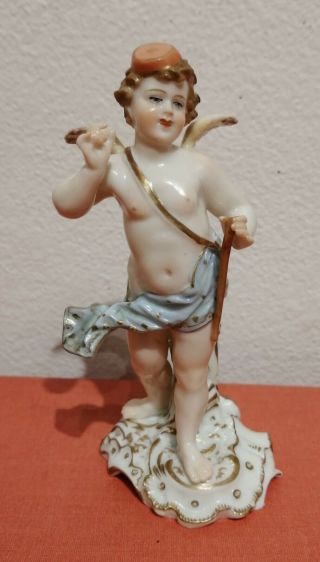 Antique European Porcelain Figure Of A Cherub,