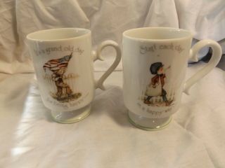 Set Of 2 Holly Hobbie Porcelain Mugs 1974 - Boy W/flag & Paper Boy