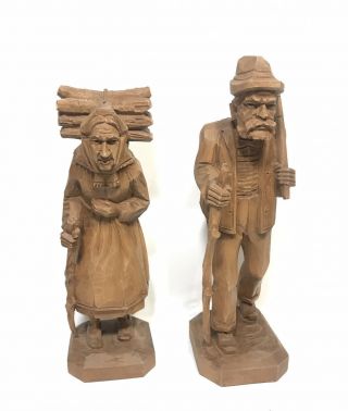 Set Of 2 Old Man & Woman Hand Carved Wood Figurines/statues Carrying Wood & Axe