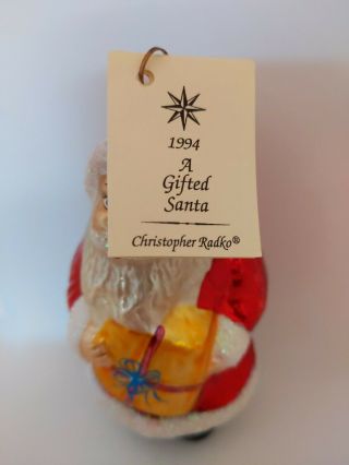Christopher Radko A Gifted Santa Christmas Ornament Santa Claus with Yellow Gift 2