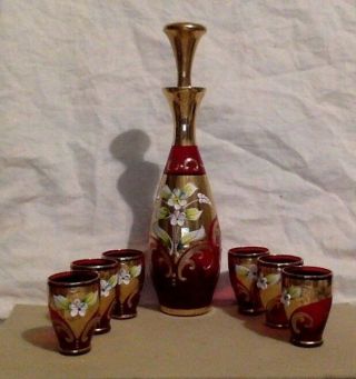Vintage Bohemian Glass Decanter Set.  Ruby Red.  Gold Guilded.  Porcelain Flowers.