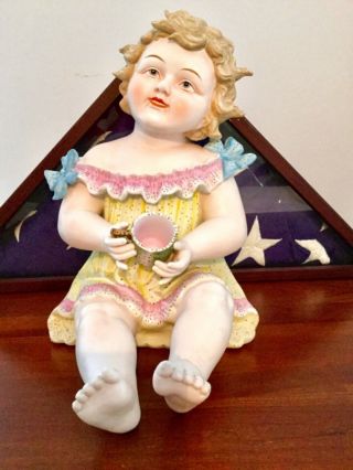 Vintage Bisque Porcelain Piano Baby Girl Holding Cup Figurine 12”
