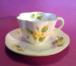 Shelley Dainty Tea Cup And Saucer - Yellow Primrose With Green Rims - England