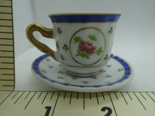Delicate Tea Cup & Saucer W Blue Edge And Pink Flowers Gold Accents X117