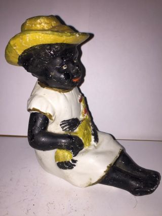 Black Americana Bisque Figure Of A Man Sitting Holding A Bottle And Chicken. 2