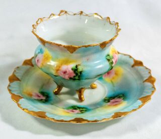 Antique Porcelain 4 footed Demitasse Cup and Saucer with gold trim and handle 3