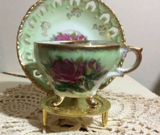 Vintage 3 Footed Red Rose Teacup And Reticulated Saucer Accented With Gold Trim