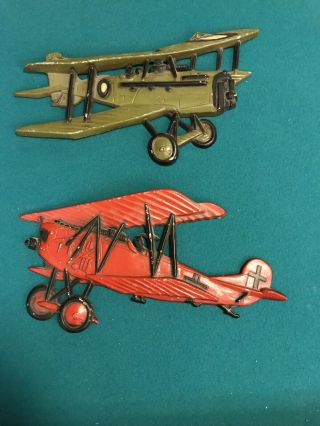 2 Vintage Sexton Cast Metal Bi Planes Wall Hangings One Green And One Red Cross