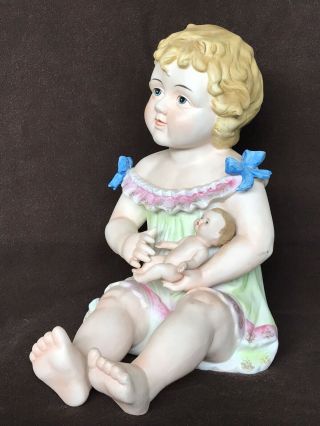 Vintage Bisque Porcelain 12 " Piano Baby Girl Seated Holding A Baby