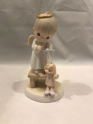 1997 Enesco Precious Moments The Good Lord Will Always Uphold Us Angel Figurine