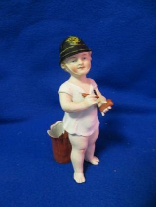 vintage porcelain bisque match holder,  child as a Bobby writing ticket 2