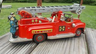 Vintage Battery Operated Tin Toy Fire Ladder Truck Made In Japan