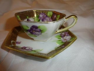 Antique Nippon M Hand Painted Six Sided Tea Cup And Saucer Violets W/ Gold Trim