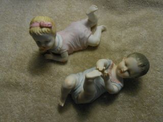 Pair Antique Bisque Piano Baby Figurines Boy & Girl