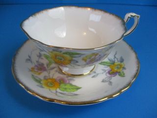 Paragon Cup & Saucer White With Yellow Flowers Double Warrant