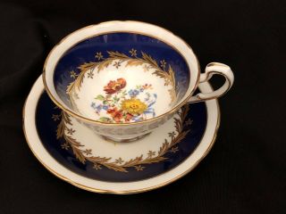 Paragon Tea Cup And Saucer Cobalt Blue Gold Leaves Wild Flowers