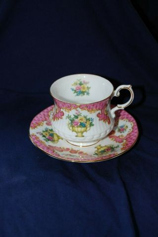 Vintage Queen Bone China Footed Tea Cup And Saucer Rare Pink Floral