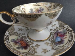 Old Vintage Hand Painted Figural Courting Scene Footed Pedestal Cup Saucer Set