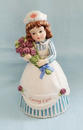 Enesco Marjorie Sarnat " Loving Care " Nurse Bell Figurine