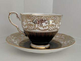 Vintage Royal Stafford Tea Cup And Saucer.  Black,  Creme And Elegant Gold