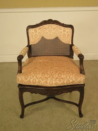 22904e: French Louis Xiv Upholstered & Cane Back Arm Chair