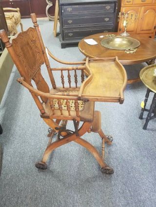 Antique Oak Convertible High Chair w.  Caned Seat & Cast Iron Wheels 3