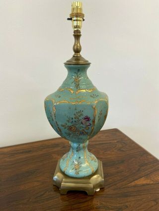 A Vintage Hand Painted Porcelain And Brass Table Lamps