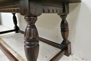 Vintage English Carved Oak Tudor Style Coffee Table With Stretcher Base
