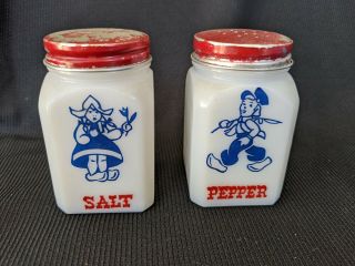 Vintage White Milk Glass Dutch Boy And Girl Salt & Pepper Shakers Red Metal Lids